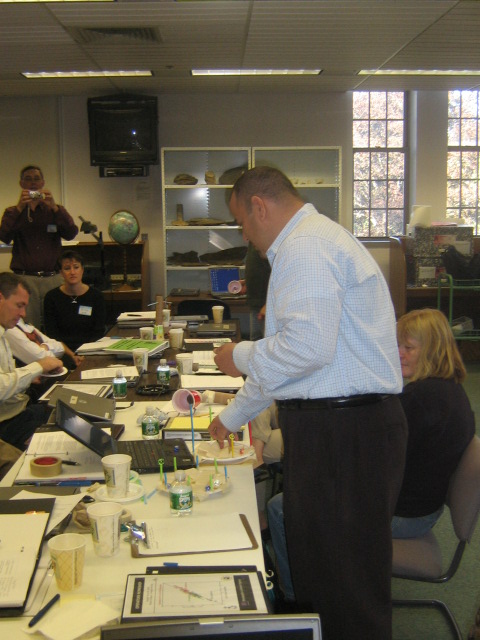 Participant explains the core principles of their seismgraph to other participants